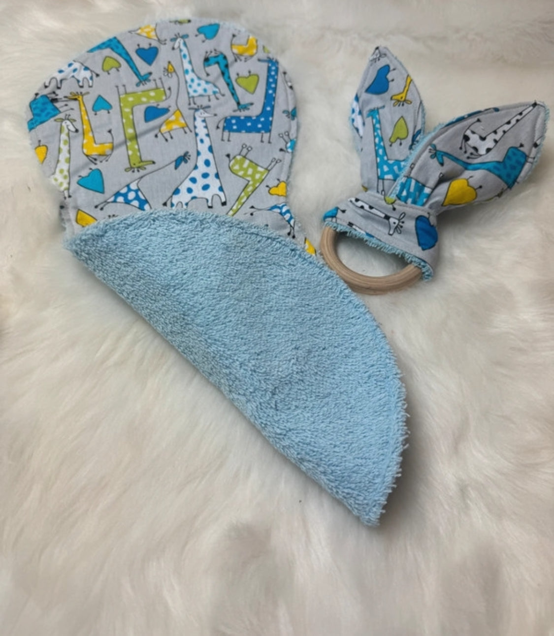 BAVOIR D'EPAULE ET ANNEAUX DE DENTITION